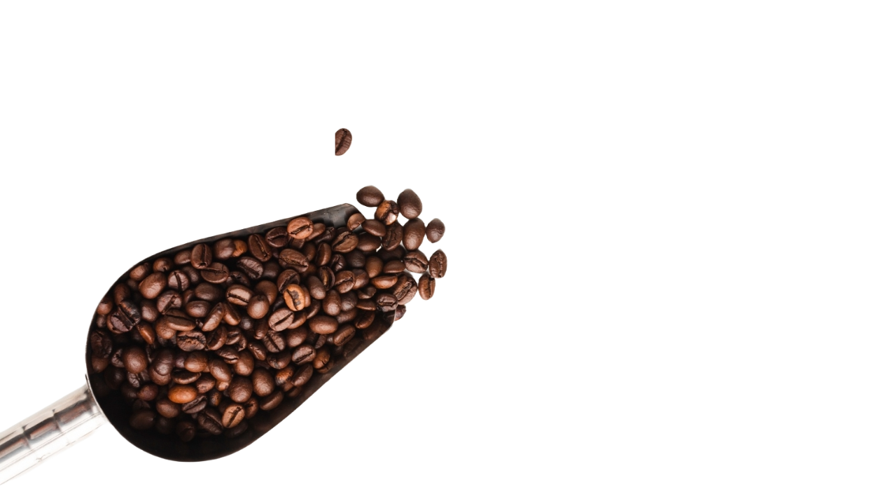 Spoon of coffee beans